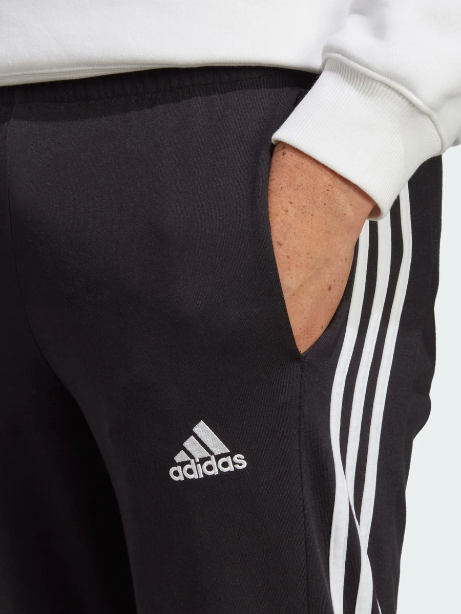Adidas Брюки мужские ESSENTIALS SINGLE JERSEY TAPERED OPEN HEM 3-STRIPES PANTS