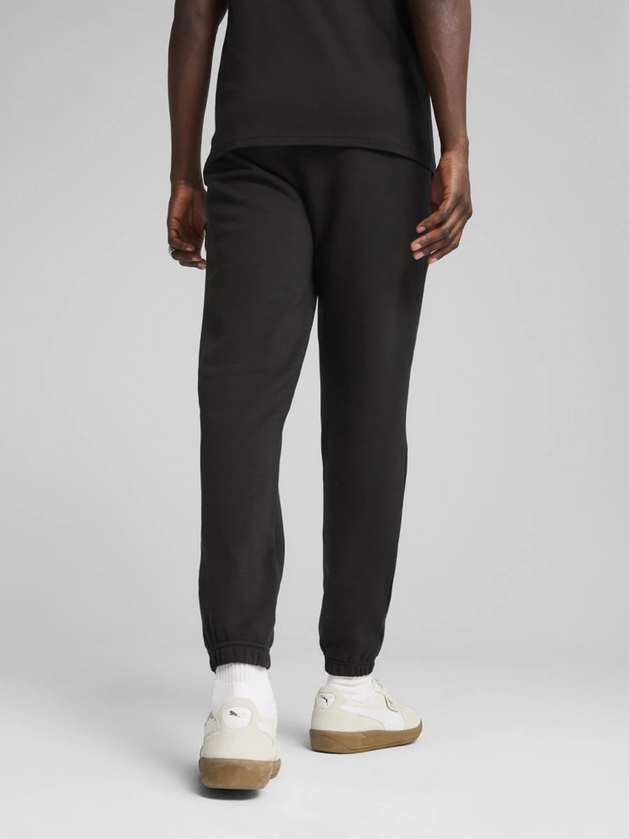 Puma Брюки мужские WARDROBE ESS SPORTS LEGACY GRAPHIC SP TR CL