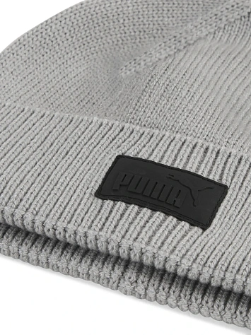 Puma Шапка ESS ELEVATED RUBBER PATCH LOW CROWN BEANIE